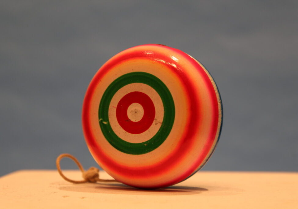 Retro yo-yo with red, green circles